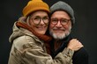 © CogniLens - Portrait of a glad caucasian couple in their 50s hugging each other