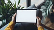 © Ifra - Person holding tablet with blank   562B3