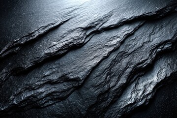 Poster - Textured black slate surface with unique patterns and light reflections showcasing natural beauty