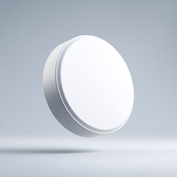 Blank white circular object, possibly a cosmetic or pill container,  floating in a simple light gray studio setting