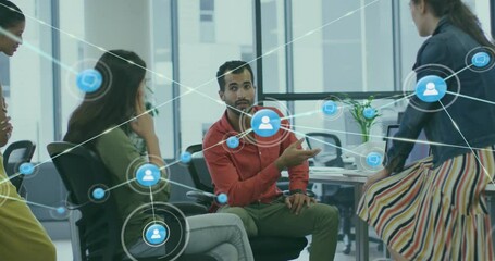 Poster - Colleagues discussing in business meeting area generating network icons showing collaboration