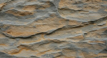 Poster - A rock wall with a rough, textured surface