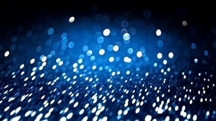 Poster - Abstract glowing surface showing bokeh effect with sparkling particles on a dark background creating a magical, festive, and elegant atmosphere.