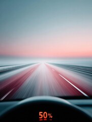Aufkleber - Electric car dashboard showing 50 percent battery on highway at dusk with blurred road, capturing modern range awareness and sustainable driving urgency