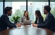 © zhao - Colleagues staff employees talking at team office company meeting sit at conference table behind glass door. Businesspeople workers group collaborating at briefing in boardroom on blurred background.