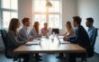 © zhao - Blurred Team Meeting Room - Soft-focus image of a team meeting room with people and furnishings. High quality