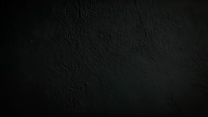 Poster - Subtle Textured Black Concrete Wall Background With Uneven Lighting Across Dark Plaster Interior Surface