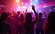 © happy - Nightlife and disco concept. Young people are dancing in club. High quality