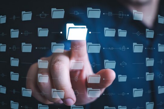 A finger highlights a folder on a digital interface.