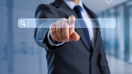 Fototapete - A businessman uses his index finger to point at a search bar on a digital screen