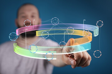 Poster - Stock photo of a man interacting with a futuristic 3D data visualization interface.