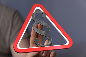 Poster - Hand holding a digital warning sign with a paragraph symbol.  Legal, law, warning concept.