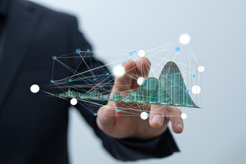 Poster - Hand holding a digital graph showing data analysis and network connections.