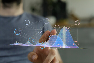 Aufkleber - Close-up of a person's hand interacting with a holographic graph, showcasing data analysis and visualization.
