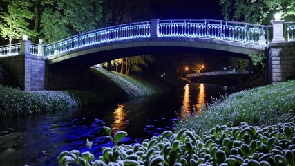Poster - Enchanted winter bridge illuminated at night with glowing blue lights, river reflection creates tranquil and serene scene