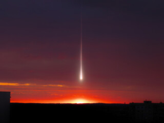 Wall Mural - meteorite in the evening sky after sunset. bolide above the horizon. beautiful shooting star isolate