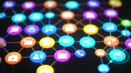 Touchscreen interface displaying colorful app icons and connection symbols.
