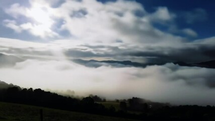 Wall Mural - Clouds colliding and merging