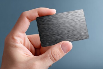 Aufkleber - Hand Holding a Metal Business Card, Representing Modern Finance and Exclusive Membership, Ideal for Luxury Branding and Corporate Identity : Generative AI