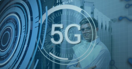 Poster - Standing telecom engineer crossing arms in data center with racks, cables and 5G overlay copy space