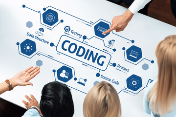 Leinwandbilder - A diverse group of people engaged in a discussion about coding concepts displayed on a graphic table, highlighting data structure, testing, and source code. Amity