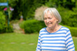 © michaelheim - Smiling Elderly Woman In Park