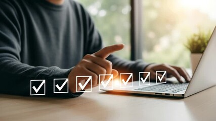 Poster - Person pointing at checklist on laptop screen with natural light in the background indoors