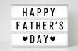 © MS - Happy Father s Day illuminated sign with hearts on a white background created by Generative AI.