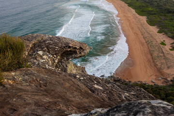 Wall Mural - Rock cliff above the beach.