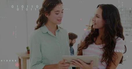 Poster - Two women tapping tablet screen and initiating code overlays reviewing code in technology office