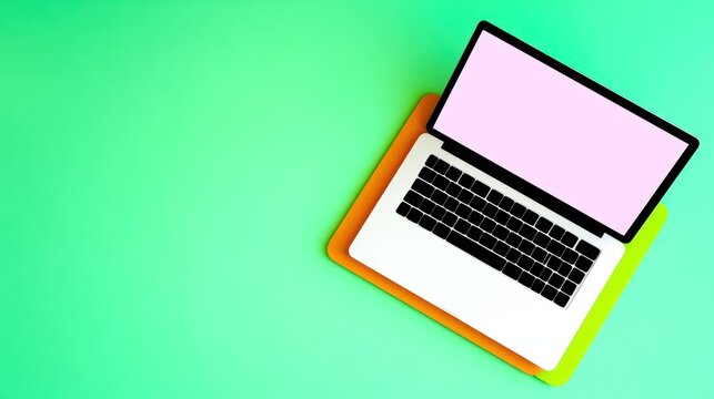 Open Laptop with Mouse and Pad on Green Background