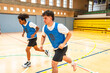© unai - Basketball players running during training in gym
