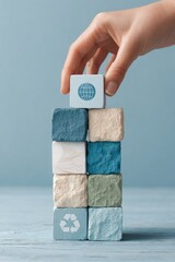 Aufkleber - Sustainable Lifecycle Analysis Concept with Hand Placing Wooden Cube Featuring Globe Icon on Stacked Recycling Symbol Blocks for Eco Consulting
