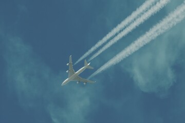 Poster - Passenger Aircraft in Mid-Flight with Four Contrails Against Clear Sky, Modern Aviation Concept for Travel and Tourism Marketing, Adventure Inspiration