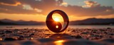 Serene Sunset Landscape with Yin Yang Sphere on Pebbly Beach