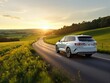 © VideoFlow - White SUV driving on countryside road during sunset with green hills and trees surrounding the winding asphalt highway scene. Ai generative.