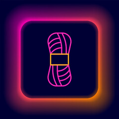Poster - Glowing neon line Yarn icon isolated on black background. Label for hand made, knitting or tailor shop. Colorful outline concept. Vector