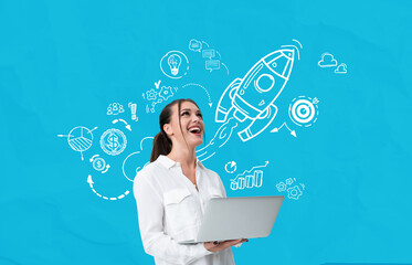 Poster - Smiling woman holding laptop with startup rocket and business su