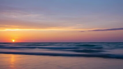 Wall Mural - Tranquil sunset over ocean waves with serene sky and reflective beach
