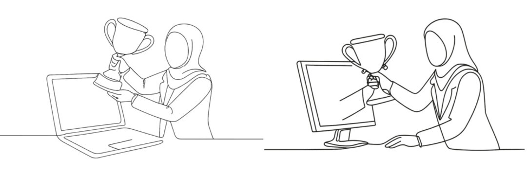 Celebration of achievement with a trophy held in front of a laptop and a computer during a virtual event