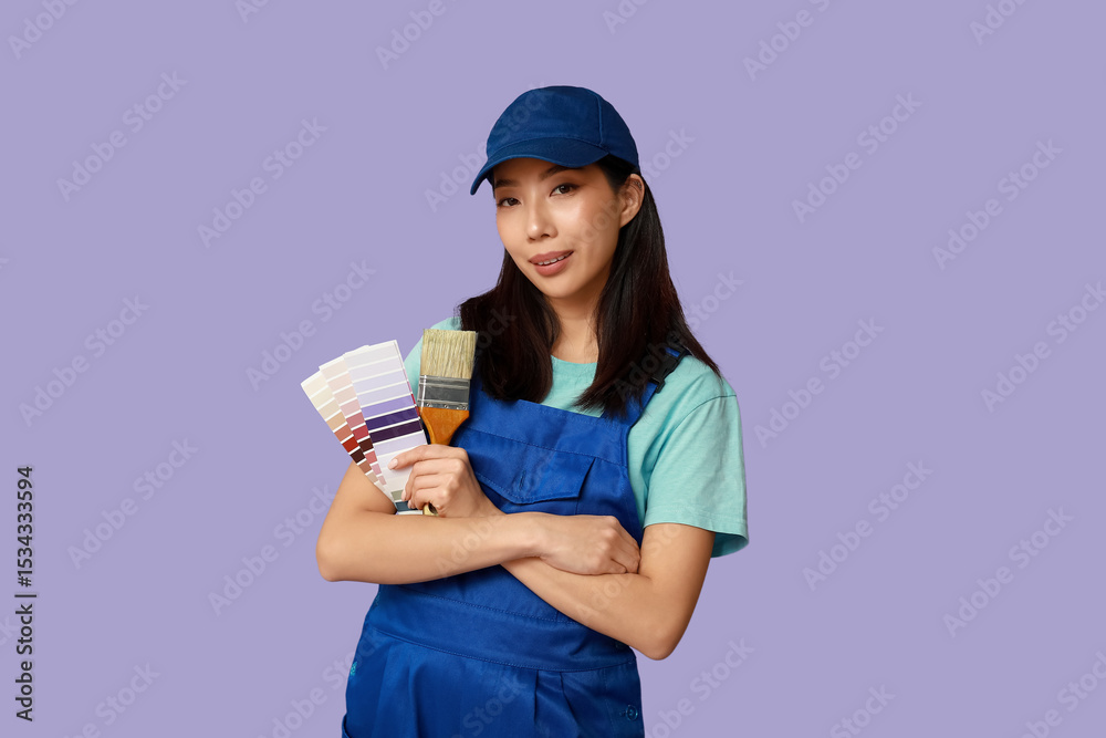 Foto de Stock Female Asian painter with brush and paint color palettes ...