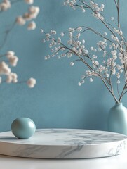 Poster - Elegant Still Life Arrangement Featuring a Blue Vase and Decorative Elements on a Marble Surface Against a Soft Blue Background