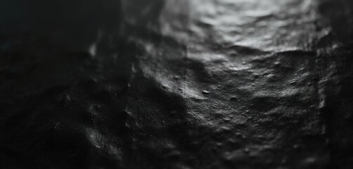 Poster - Abstract black foil gradient texture background with uneven surface. Rough metal material texture with dark space for design, banner and wallpaper. Glossy and luxurious effect.