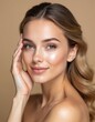 © Viktor - Beautiful young woman beauty portrait. Brunette with long wavy hair smiles gently. Portrait with perfect skin, makeup, manicure, healthy, glowing face. Skincare, cosmetology, spa concept. Beige