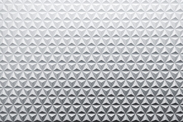 Poster - Geometric diamond-shaped triangle wall panels with abstract modern texture pattern in futuristic architectural design style background. 3D Rendering