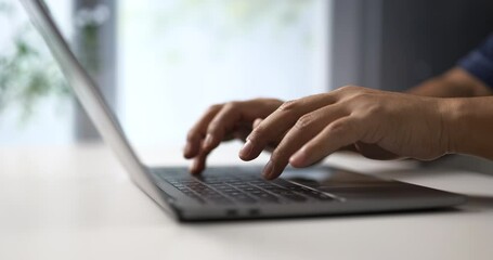 Poster - Hands typing on keyboard in minimal workspace
