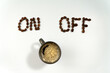 © JOSEANTONA - Coffee beans forming the words on and off, with a coffee cup underneath, symbolizing a coffee break