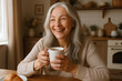 © startang141 - Peaceful older woman enjoying tea, with a serene and content smile