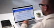 © Andrey Popov - Online Performance Evaluation Form: African American Employee Filling