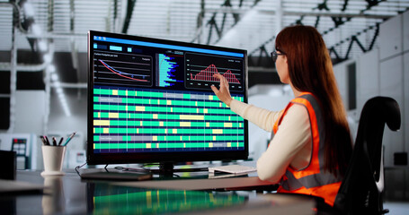 Poster - Female Engineer Operating Control Panel